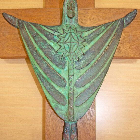 Cast bronze with green oxide patina. Wood. Figure 46cmH x 46cmW x 8cmD